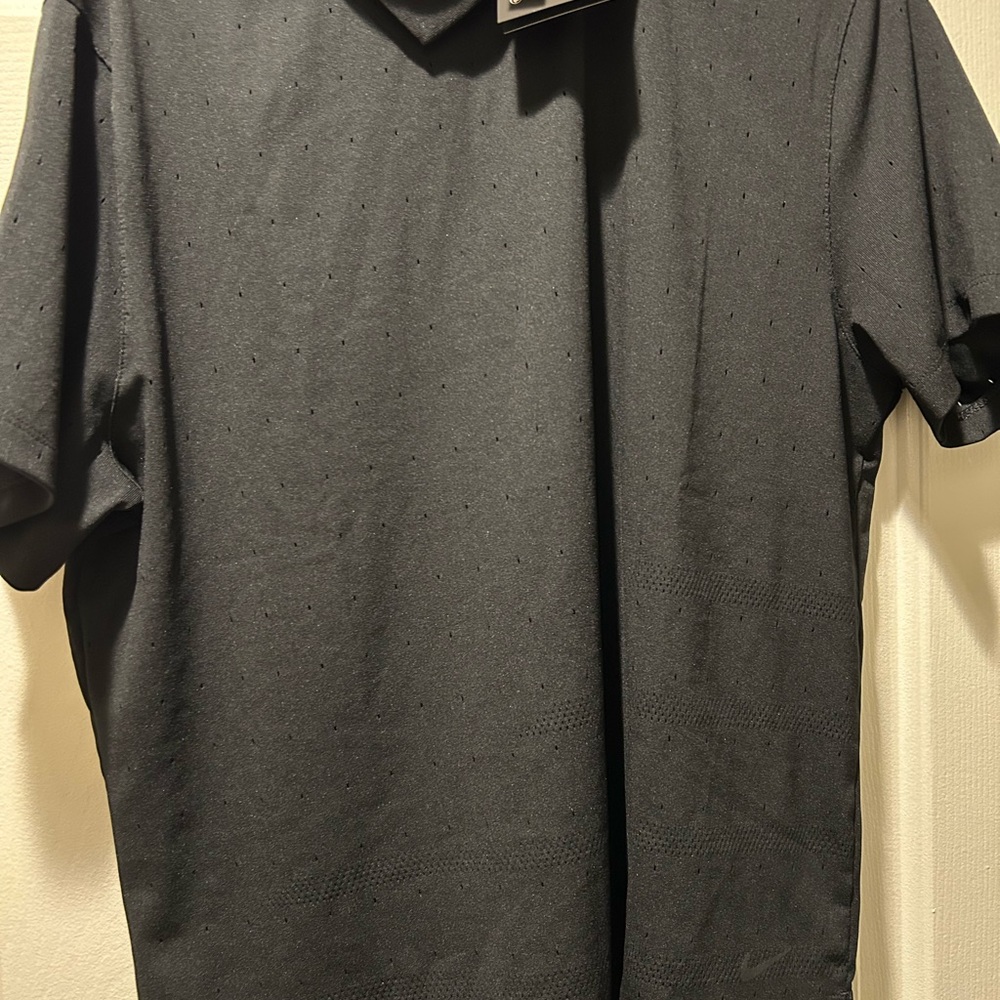 Nike Black Polo Shirt with Short Sleeves and Relaxed Fit